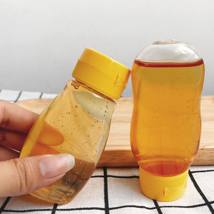 Clear 12oz plastic squeeze honey bottles with flip top cap bulk