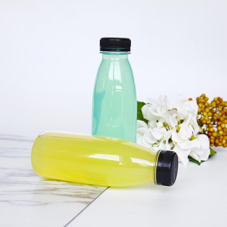 Clear 16oz food grade plastic milk bottles with twist off tops