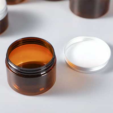 Colored 100ml amber plastic cream jars with lids for beauty products