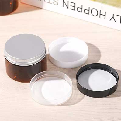 Colored 100ml amber plastic cream jars with lids for beauty products