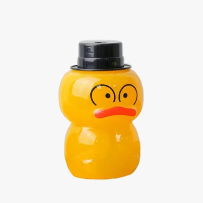 Unique design PET clear 500ml duck shaped bottle with straw for juicing