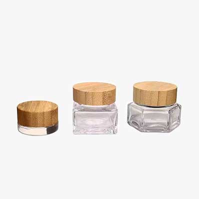 Custom shapes and size clear 30g glass eye cream jars with bamboo lids for toiletry
