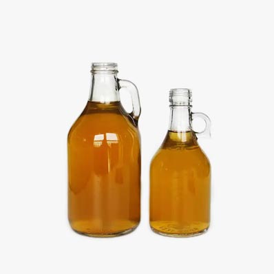 Wholesale clear 64oz glass growler with lid and handle for beer/kombucha