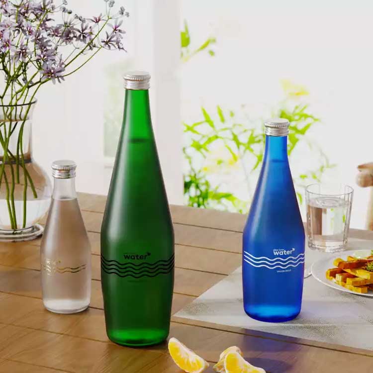 Factory price 750ml glass sparkling water bottle with caps wholesale