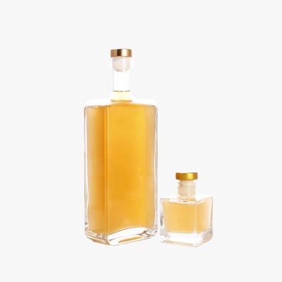 Fancy clear 500ml glass spirit bottle with gold cork wholesale