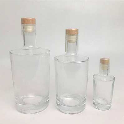 Clear 500ml 750ml glass square shoulder wine bottles with corks from bottle supplier