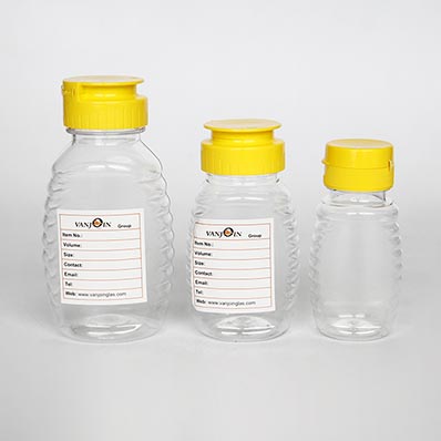 Food grade clear 8oz plastic queenline honey jars with dispensing caps