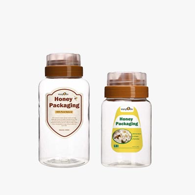 Wide mouth clear PET 16 oz plastic honey bottles with dispenser lids