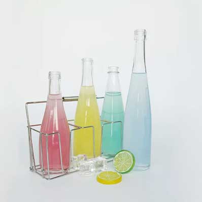 Factory price 750ml glass sparkling water bottle with caps wholesale