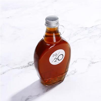 Custom 8oz 16oz clear glass maple syrup bottles with loop handle and lids