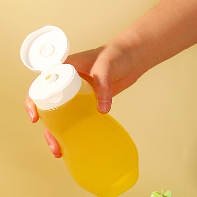 Food grade clear 330ml squeeze pet plastic honey bottles with flip top caps